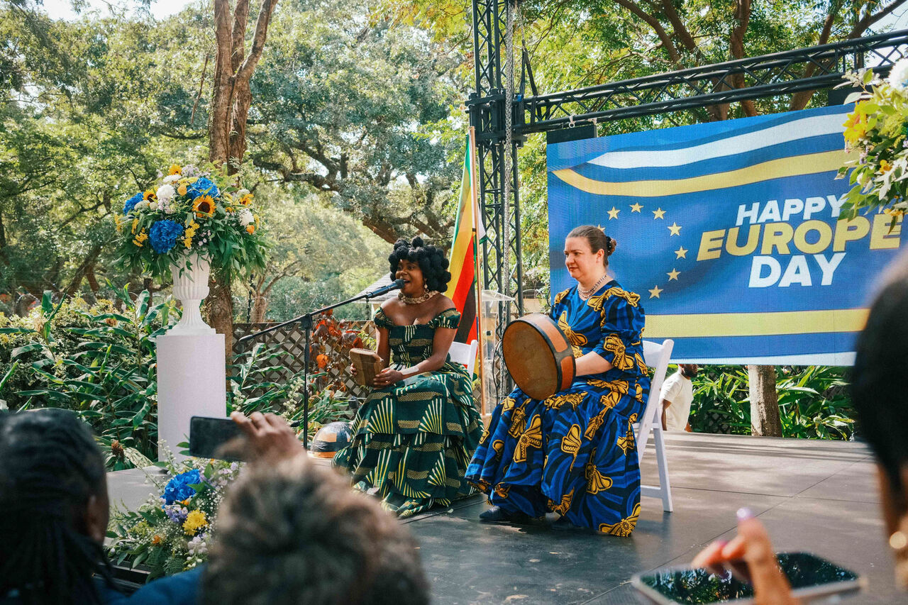 Detail of blue and yellow floral styling at a diplomatic event